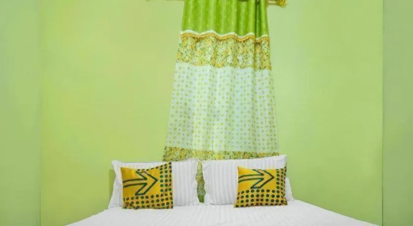 Bed in Hotel O Kost Qiu Qiu 99