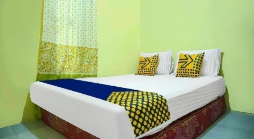 Bed in Hotel O Kost Qiu Qiu 99