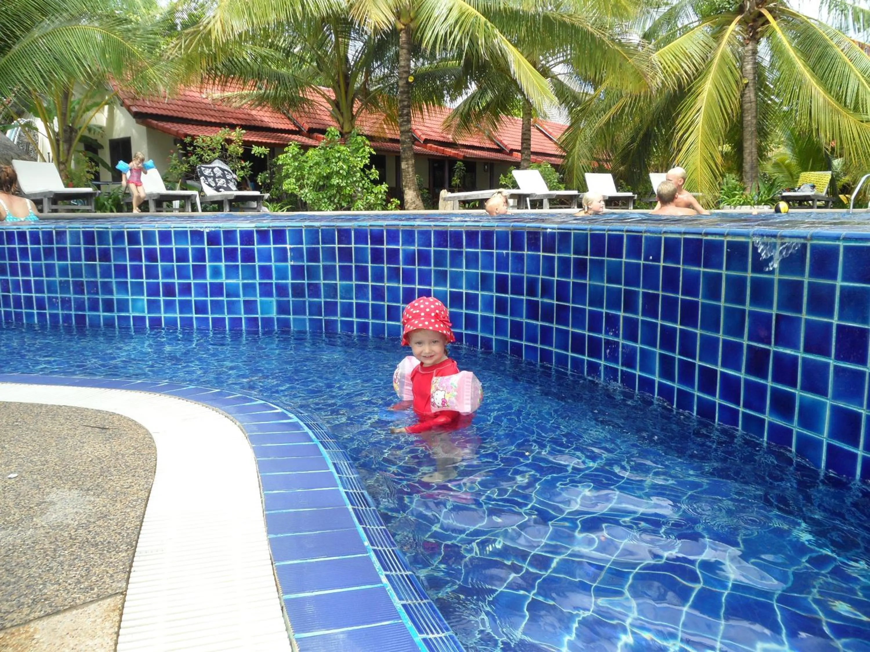 People in Noble House Beach Resort