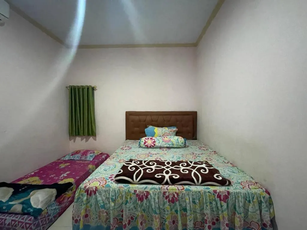 Bed in Hotel O Lima Saudara Syariah