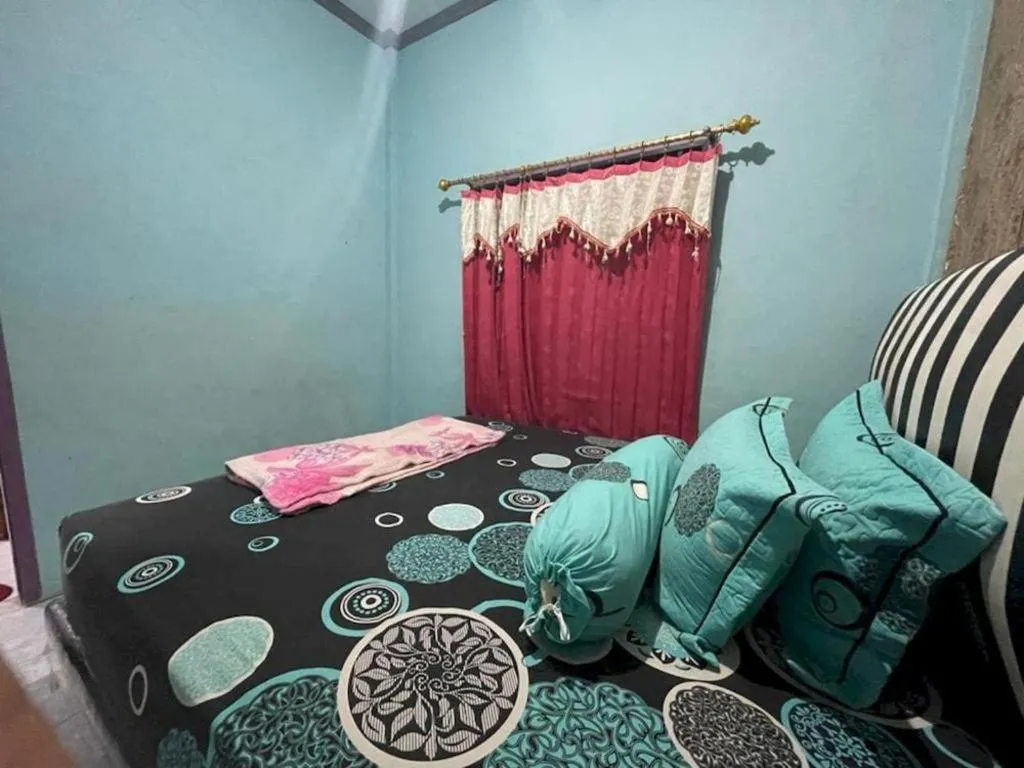 Bed in Hotel O Lima Saudara Syariah