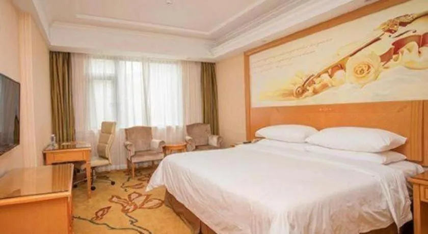 Bed in Vienna Hotel Shenzhen Bao'an Airport Taoyuanju Pingluanshan Metro Station