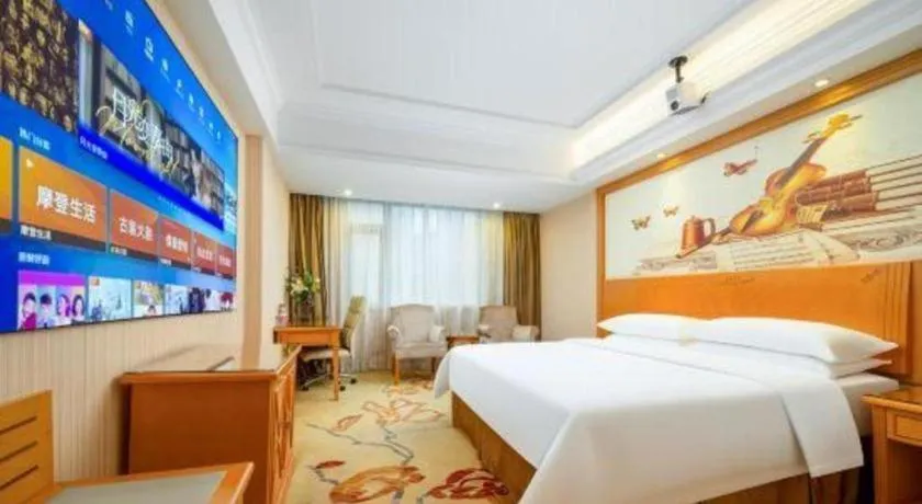 Bed in Vienna Hotel Shenzhen Bao'an Airport Taoyuanju Pingluanshan Metro Station