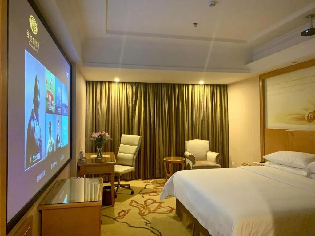 Bed in Vienna Hotel Shenzhen Bao'an Airport Taoyuanju Pingluanshan Metro Station