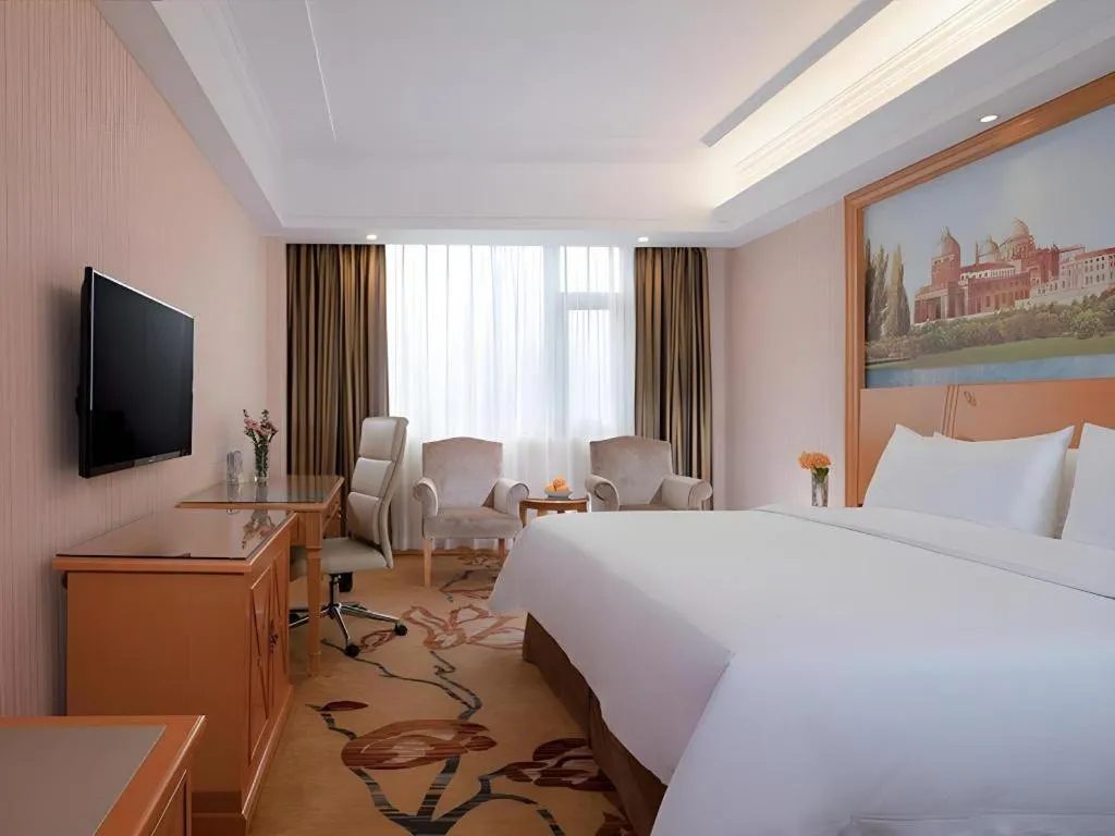 Bed in Vienna Hotel Shenzhen Bao'an Airport Taoyuanju Pingluanshan Metro Station