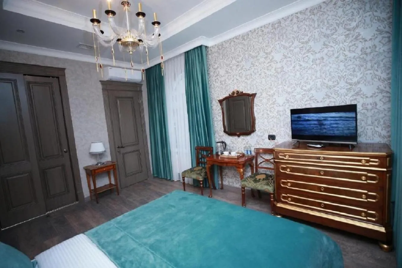 Bed in West Inn Hotel & Restaurant