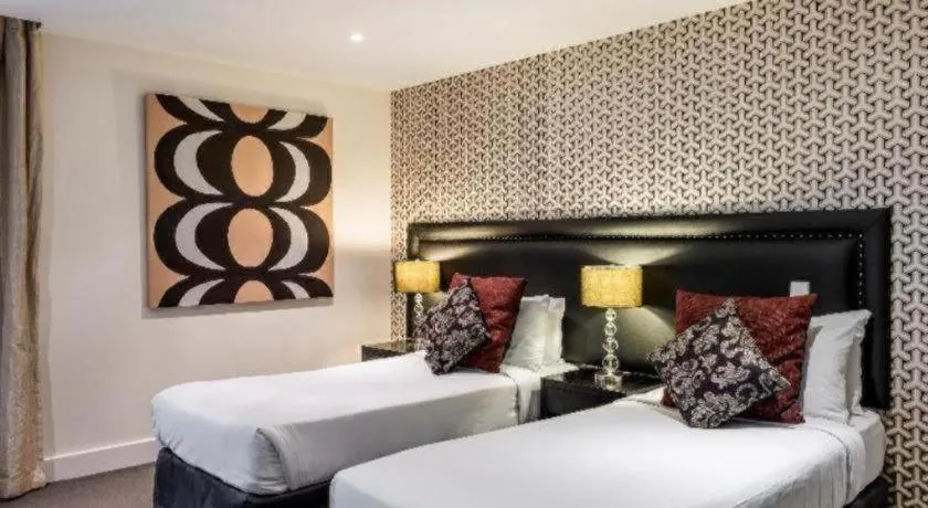 Bed in Oaks Queenstown Club Suites