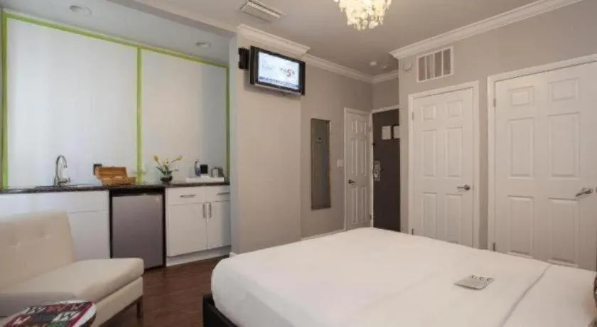 Bed in Odyssey of South Beach Apart Hotel