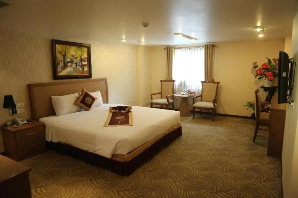 Bed in Lenid De Ho Guom Hotel