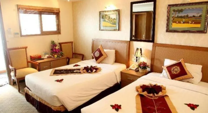 Bed in Lenid De Ho Guom Hotel