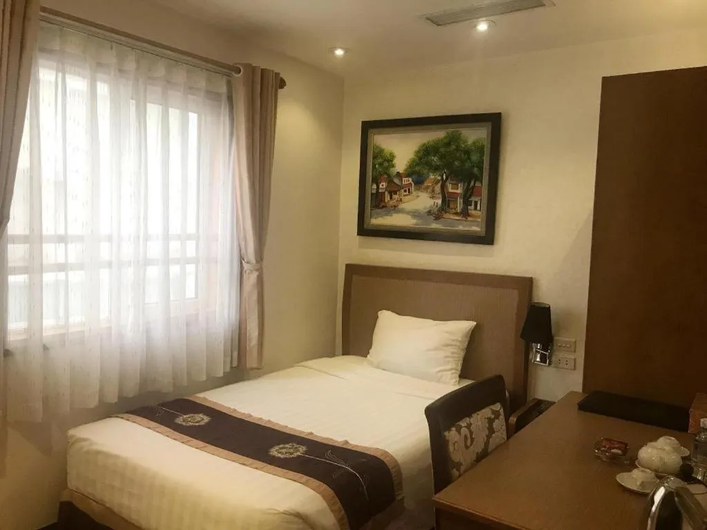 Bed in Lenid De Ho Guom Hotel