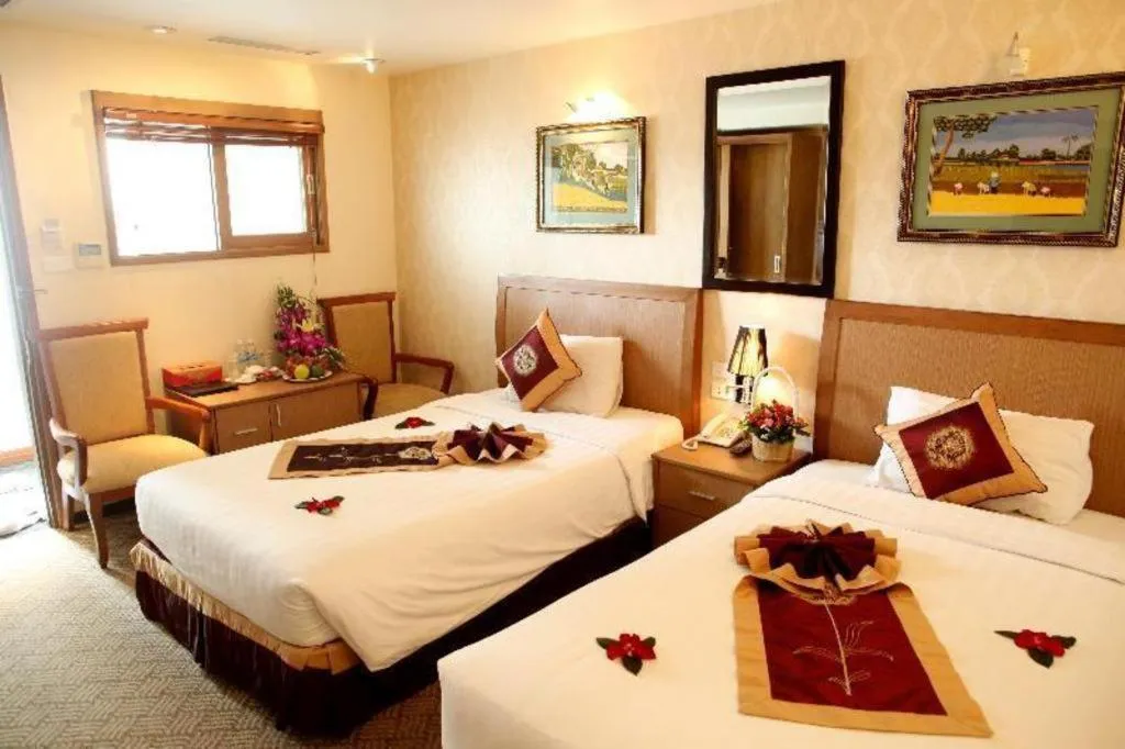 Bed in Lenid De Ho Guom Hotel