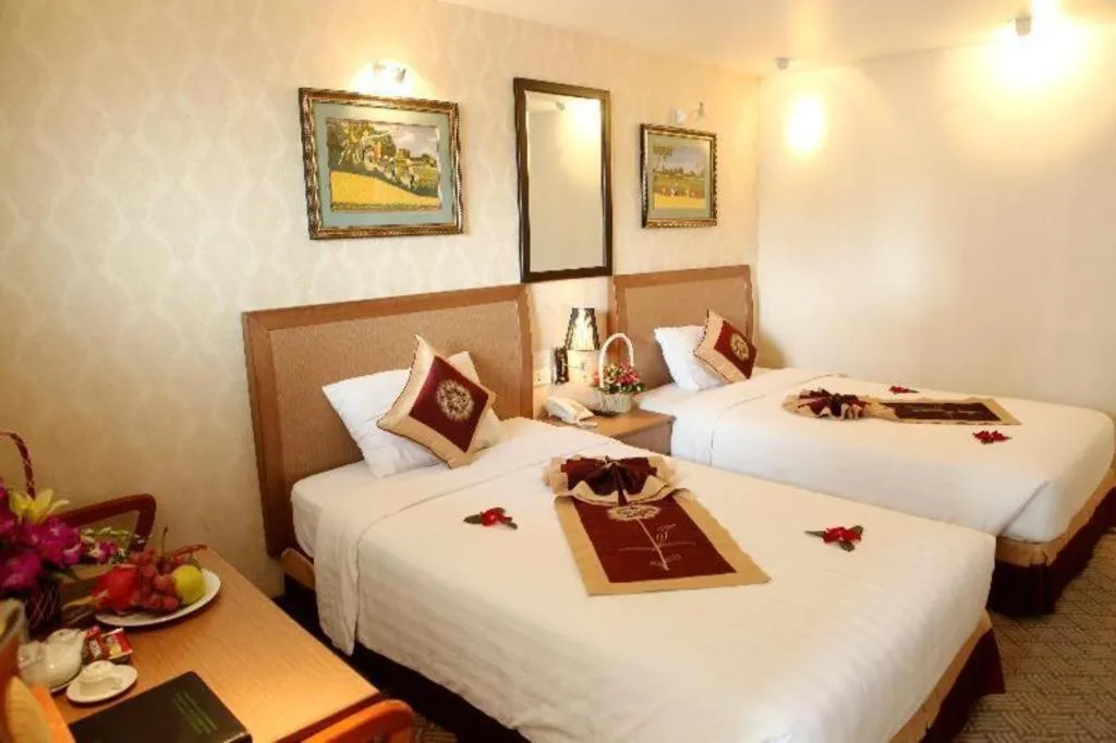 Bed in Lenid De Ho Guom Hotel