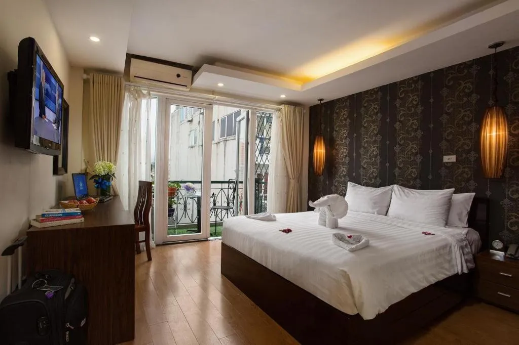 Bed in Hanoi Impressive Hotel