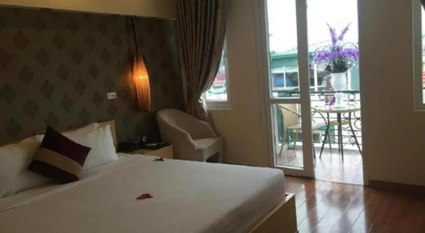 Bed in Hanoi Impressive Hotel