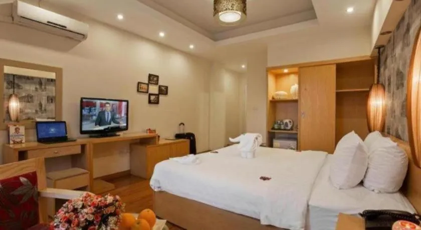 Bed in Hanoi Impressive Hotel