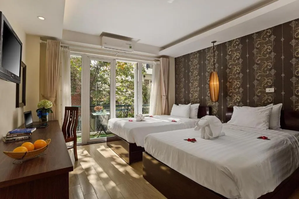 Bed in Hanoi Impressive Hotel