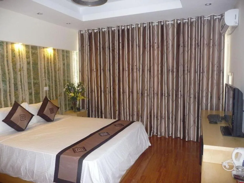 Bed in Hanoi Impressive Hotel