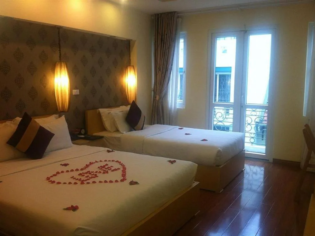 Bed in Hanoi Impressive Hotel