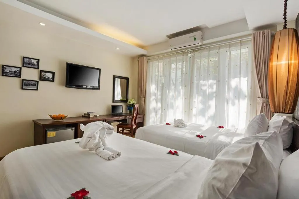 Bed in Hanoi Impressive Hotel