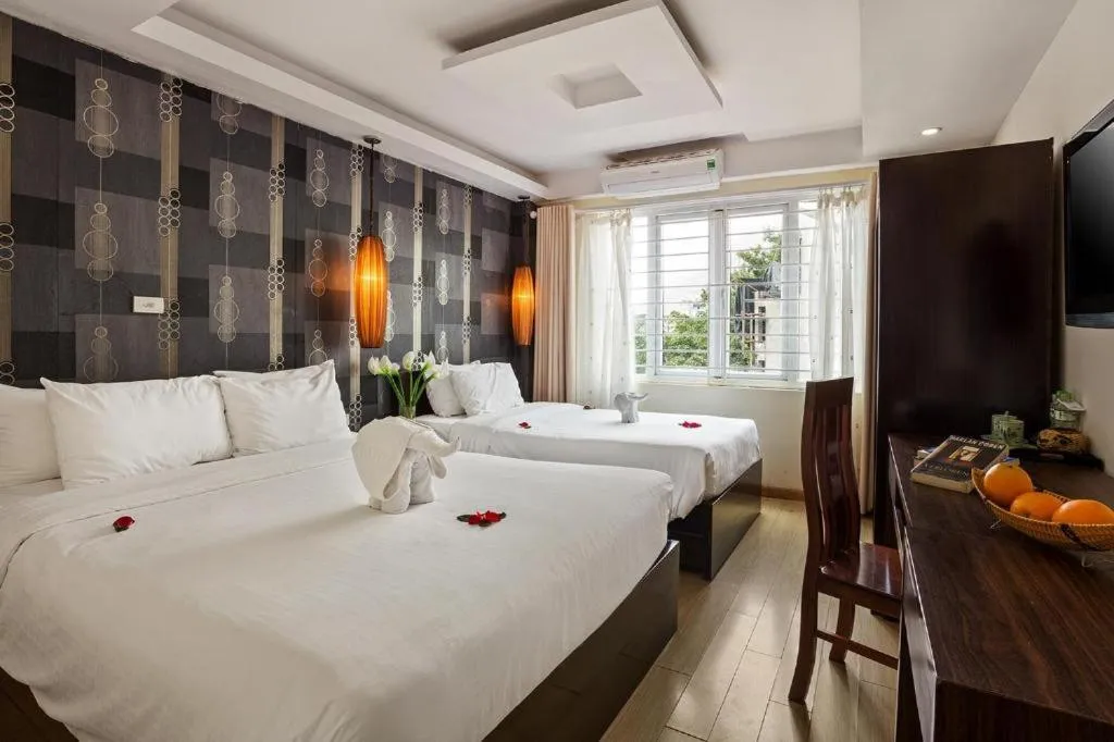 Bed in Hanoi Impressive Hotel