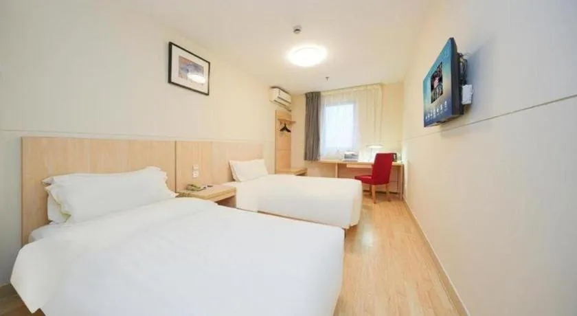 Bed in Jinjiang Inn Qingdao Hangzhou Rd.