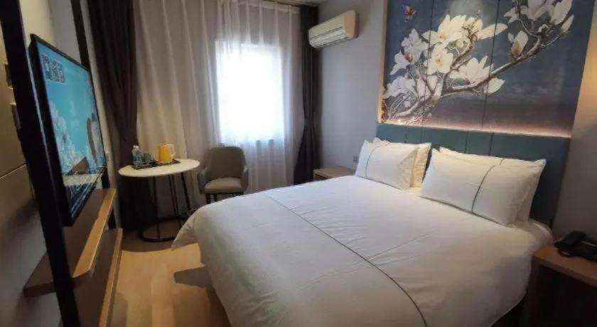 Bed in Jinjiang Inn Tianjin Station Jinwan Square