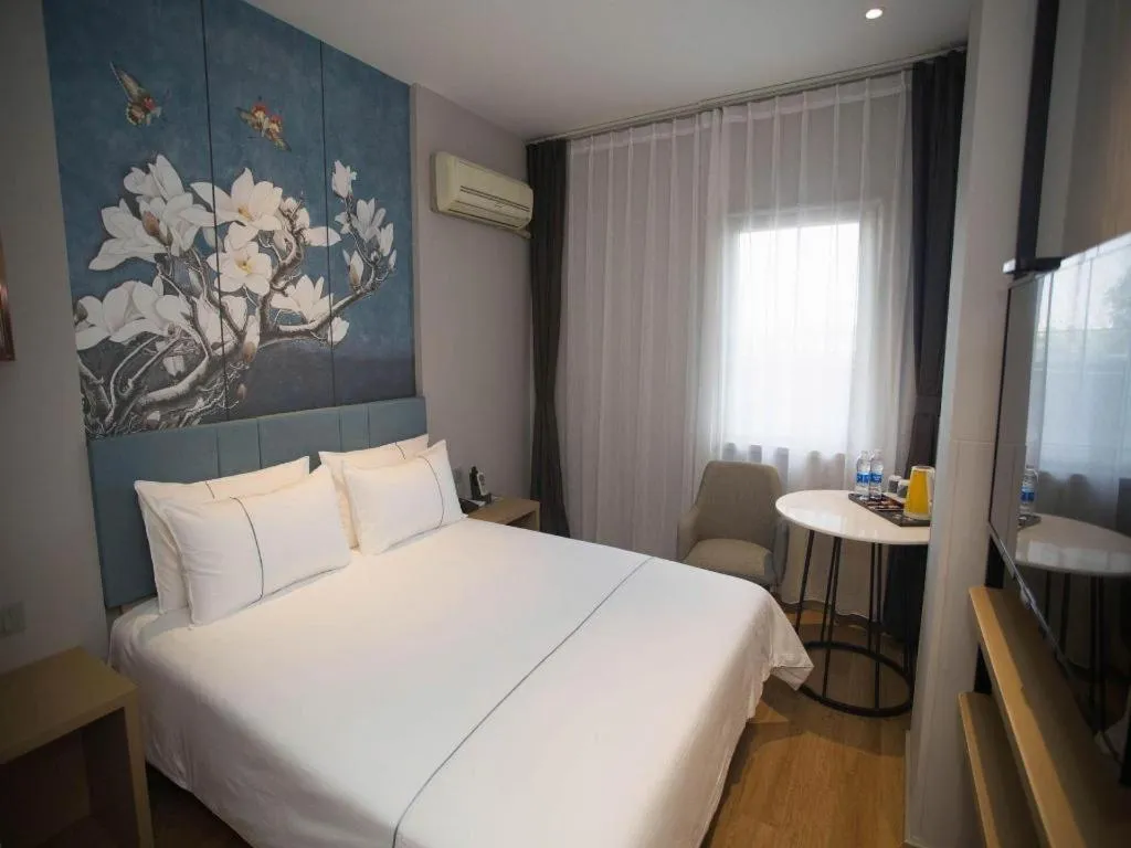 Bed in Jinjiang Inn Tianjin Station Jinwan Square