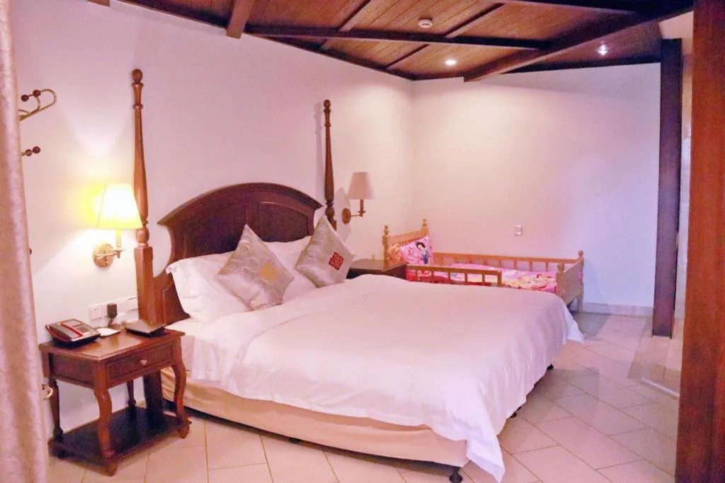 Bed in Timton Fuhe Hotel Sanya