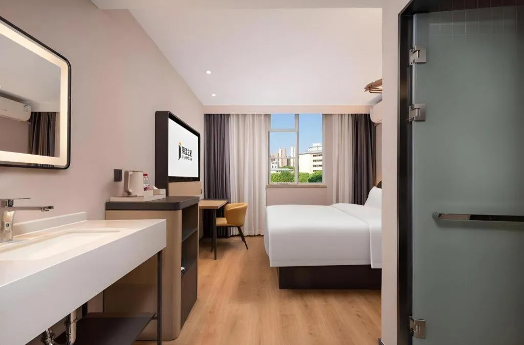 Bed in Jinjiang Inn Wuhan Hanjiang Road Metro Station Jiangtan Pedestrian Street