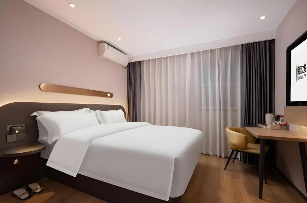 Bed in Jinjiang Inn Wuhan Hanjiang Road Metro Station Jiangtan Pedestrian Street