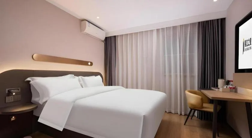 Bed in Jinjiang Inn Wuhan Hanjiang Road Metro Station Jiangtan Pedestrian Street