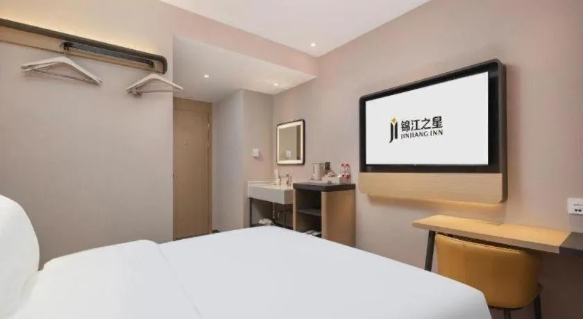 Bed in Jinjiang Inn Wuhan Hanjiang Road Metro Station Jiangtan Pedestrian Street