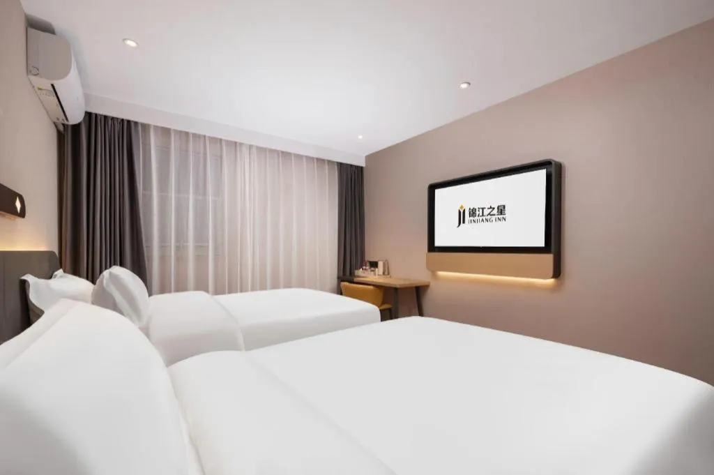 Bed in Jinjiang Inn Wuhan Hanjiang Road Metro Station Jiangtan Pedestrian Street