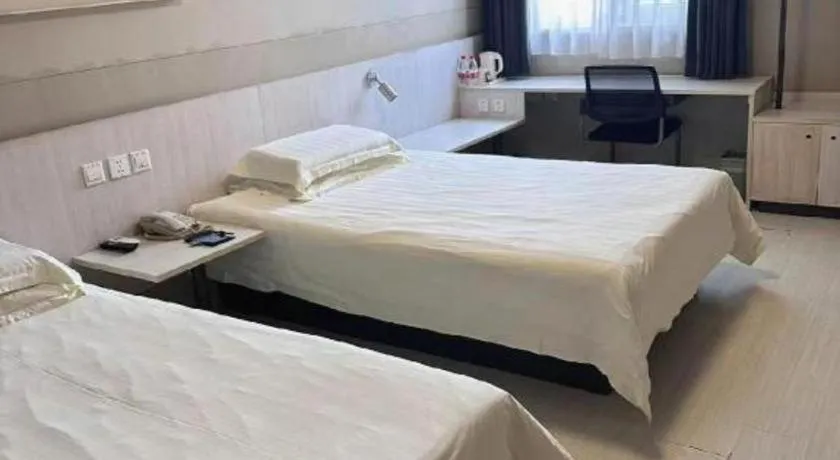 Bed in Jinjiang Inn Wuhan Hanjiang Road Metro Station Jiangtan Pedestrian Street