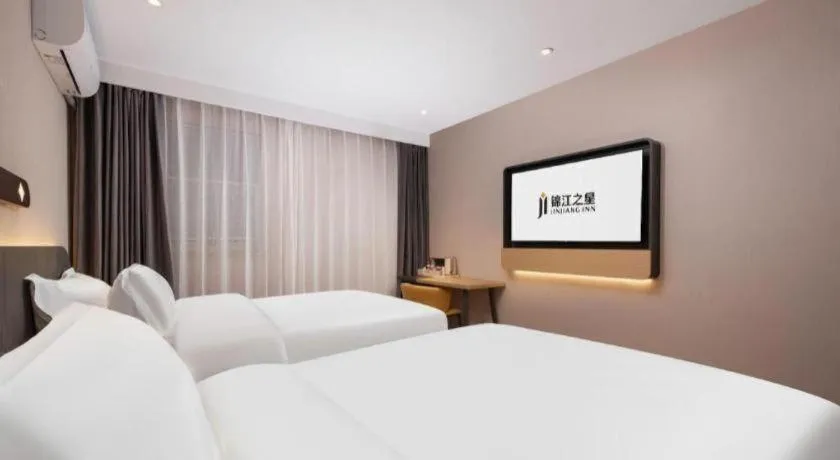 Bed in Jinjiang Inn Wuhan Hanjiang Road Metro Station Jiangtan Pedestrian Street