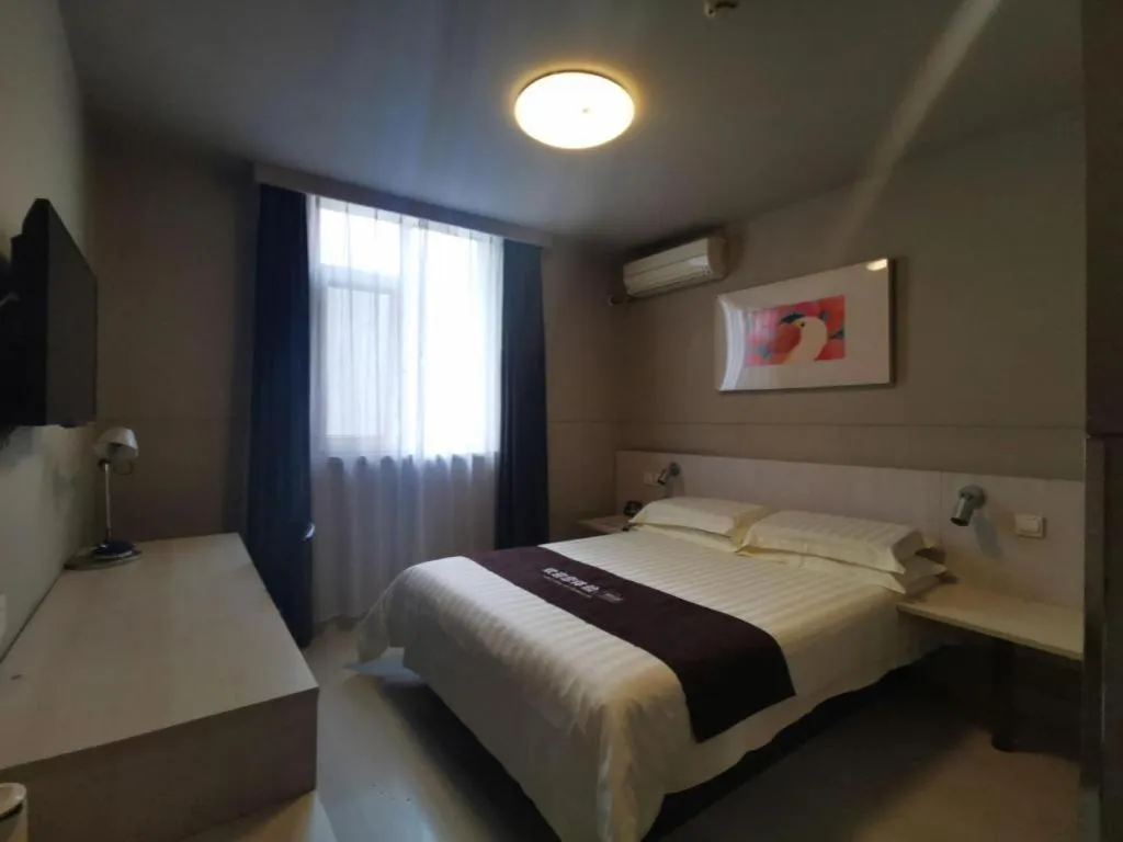 Bed in Jinjiang Inn Wuhan Hanjiang Road Metro Station Jiangtan Pedestrian Street