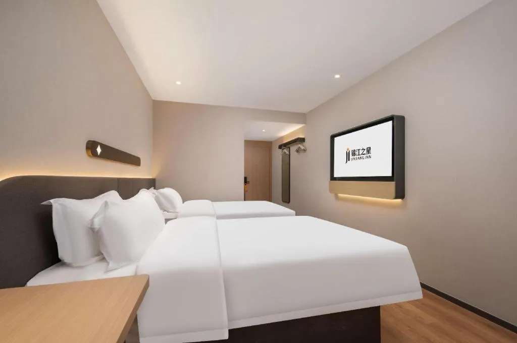 Bed in Jinjiang Inn Wuhan Hanjiang Road Metro Station Jiangtan Pedestrian Street