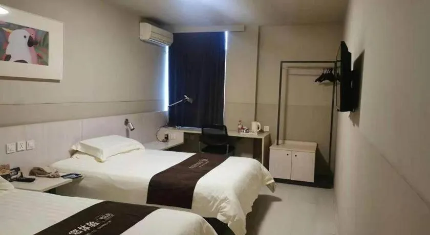 Bed in Jinjiang Inn Wuhan Hanjiang Road Metro Station Jiangtan Pedestrian Street