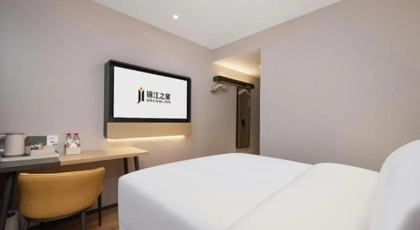 Bed in Jinjiang Inn Wuhan Hanjiang Road Metro Station Jiangtan Pedestrian Street