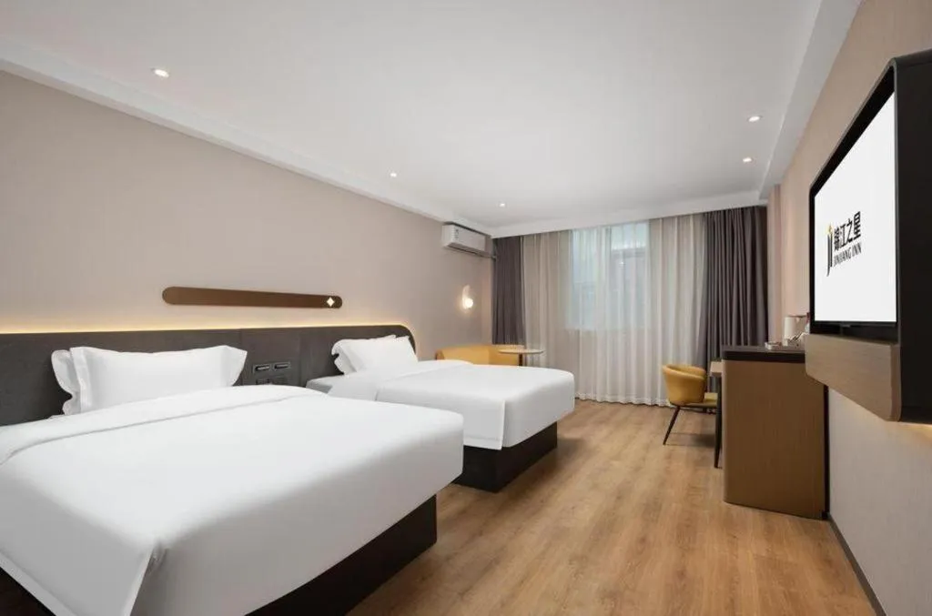 Bed in Jinjiang Inn Wuhan Hanjiang Road Metro Station Jiangtan Pedestrian Street