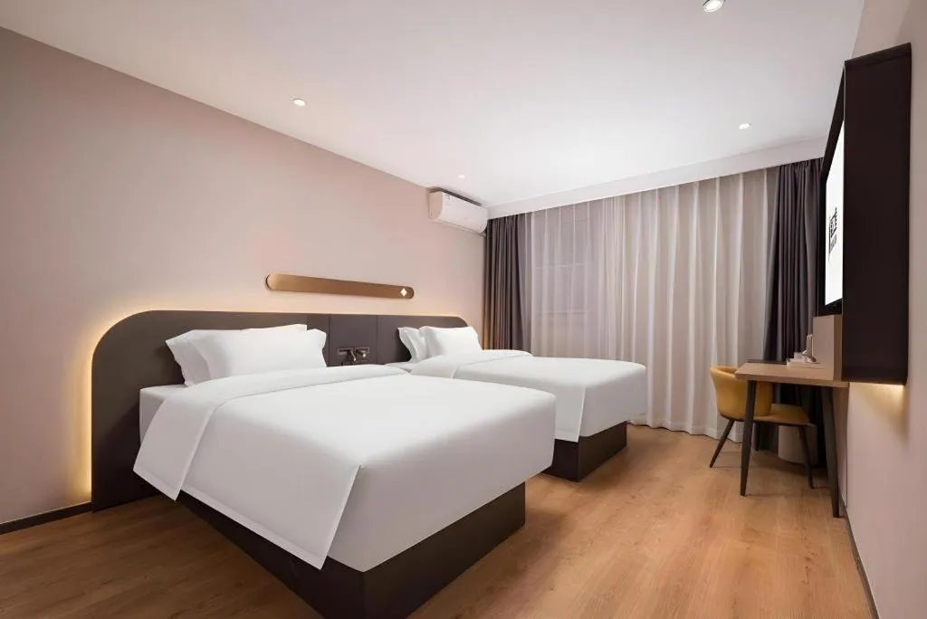 Bed in Jinjiang Inn Wuhan Hanjiang Road Metro Station Jiangtan Pedestrian Street