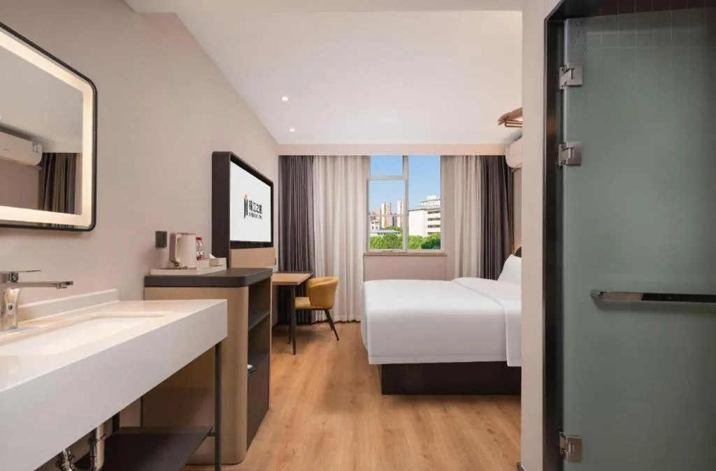 Bed in Jinjiang Inn Wuhan Hanjiang Road Metro Station Jiangtan Pedestrian Street