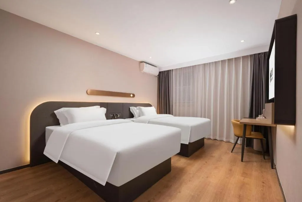 Bed in Jinjiang Inn Wuhan Hanjiang Road Metro Station Jiangtan Pedestrian Street