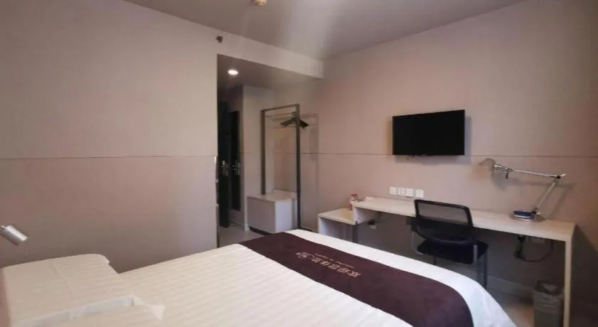 Bed in Jinjiang Inn Wuhan Hanjiang Road Metro Station Jiangtan Pedestrian Street