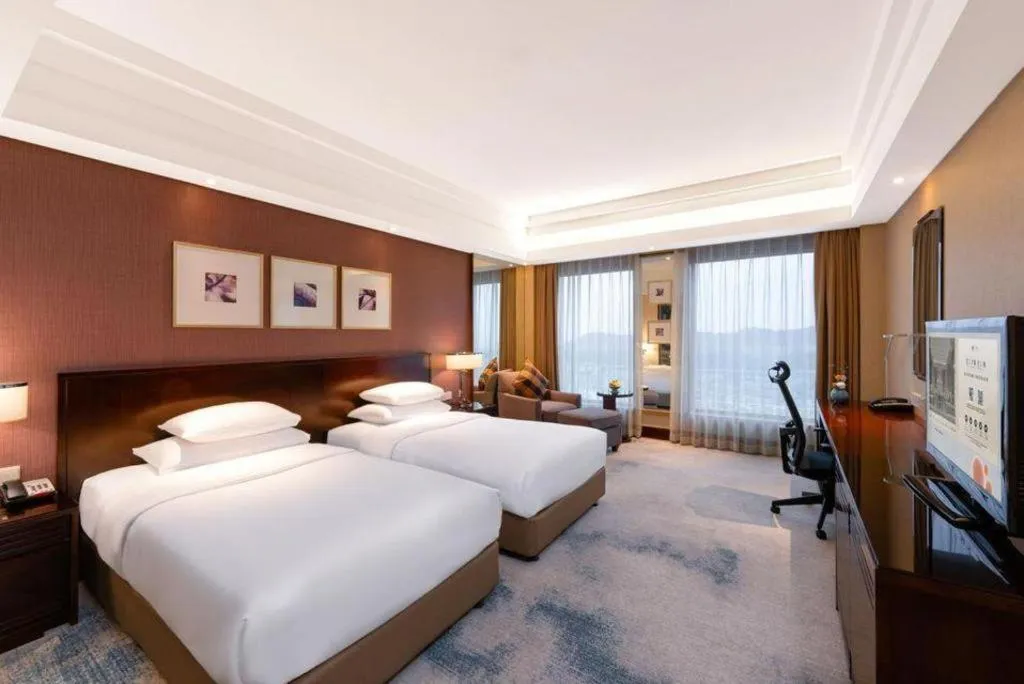 Bed in New Century Hangzhou Grand Hotel