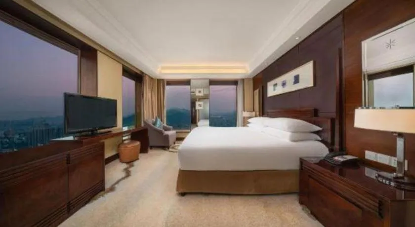 Bed in New Century Hangzhou Grand Hotel