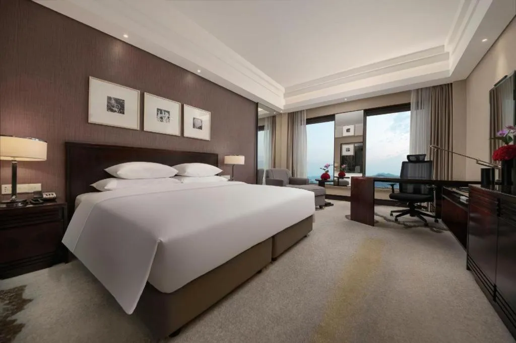 Bed in New Century Hangzhou Grand Hotel