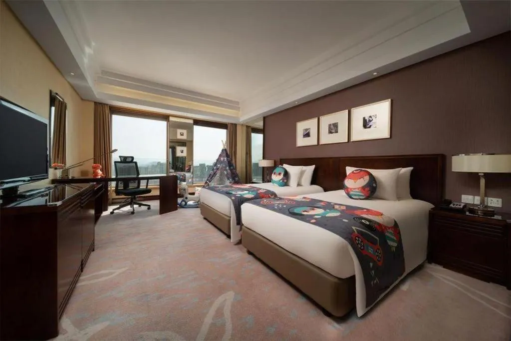 Bed in New Century Hangzhou Grand Hotel