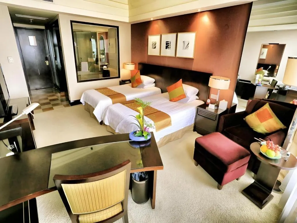 Bed in New Century Hangzhou Grand Hotel